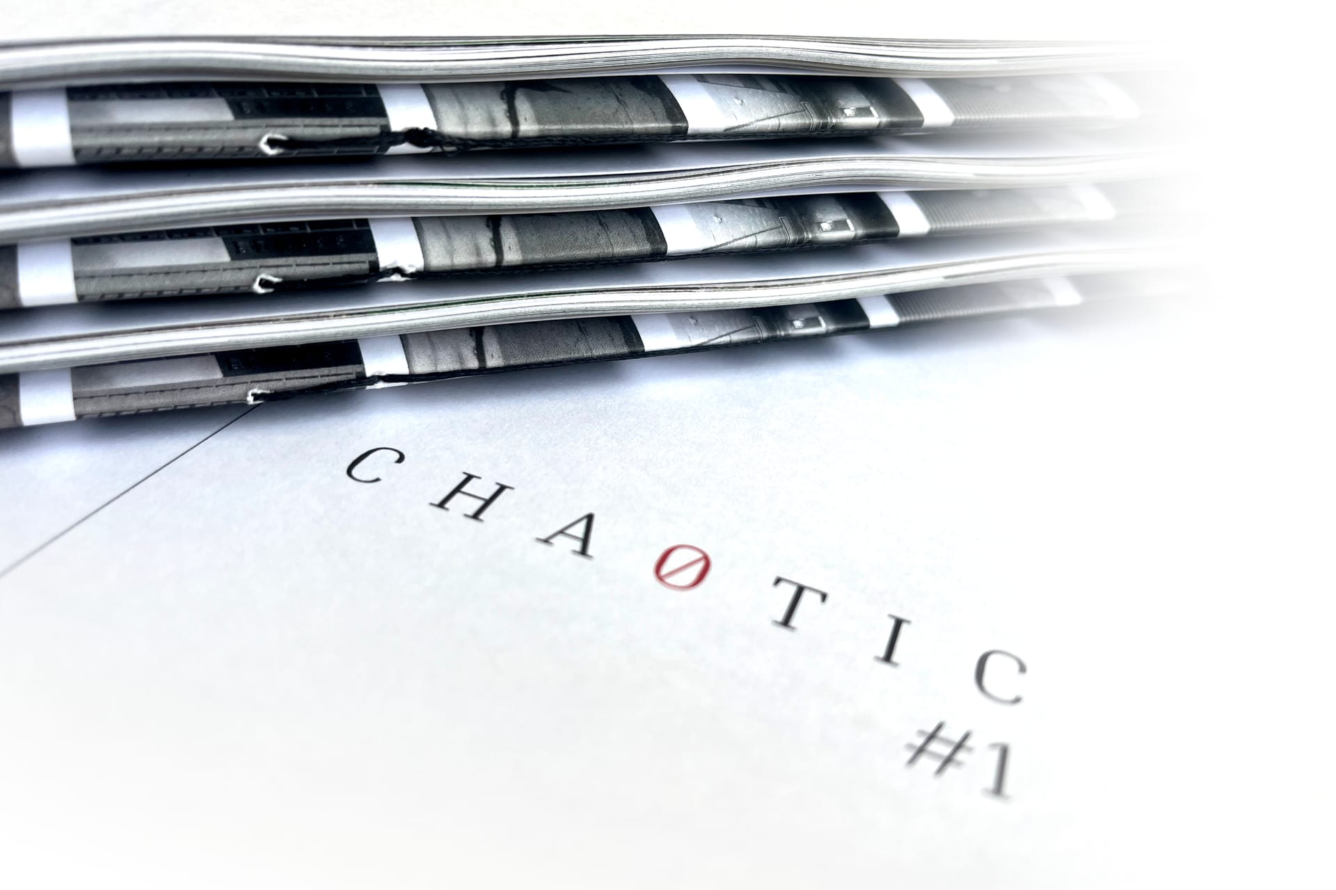 Image of several copies of Offline Journal's new 'CHAOTIC' group publication